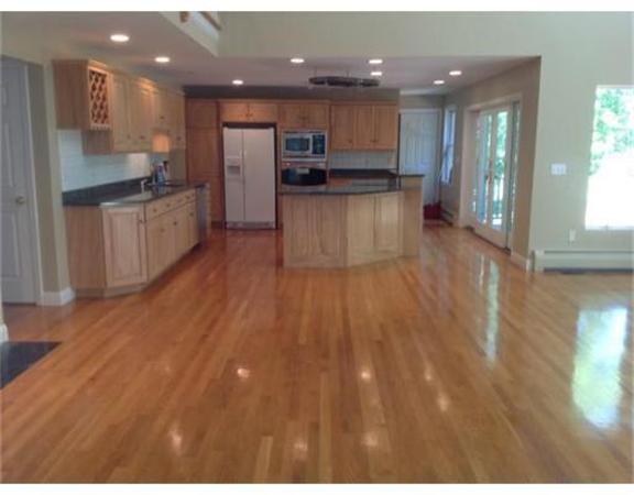 10 Sgt Roode Lane Middleton, MA 01949 - Photo 8 of 26 a kitchen with stainless steel appliances granite countertop a refrigerator a sink dishwasher and a wooden cabinets