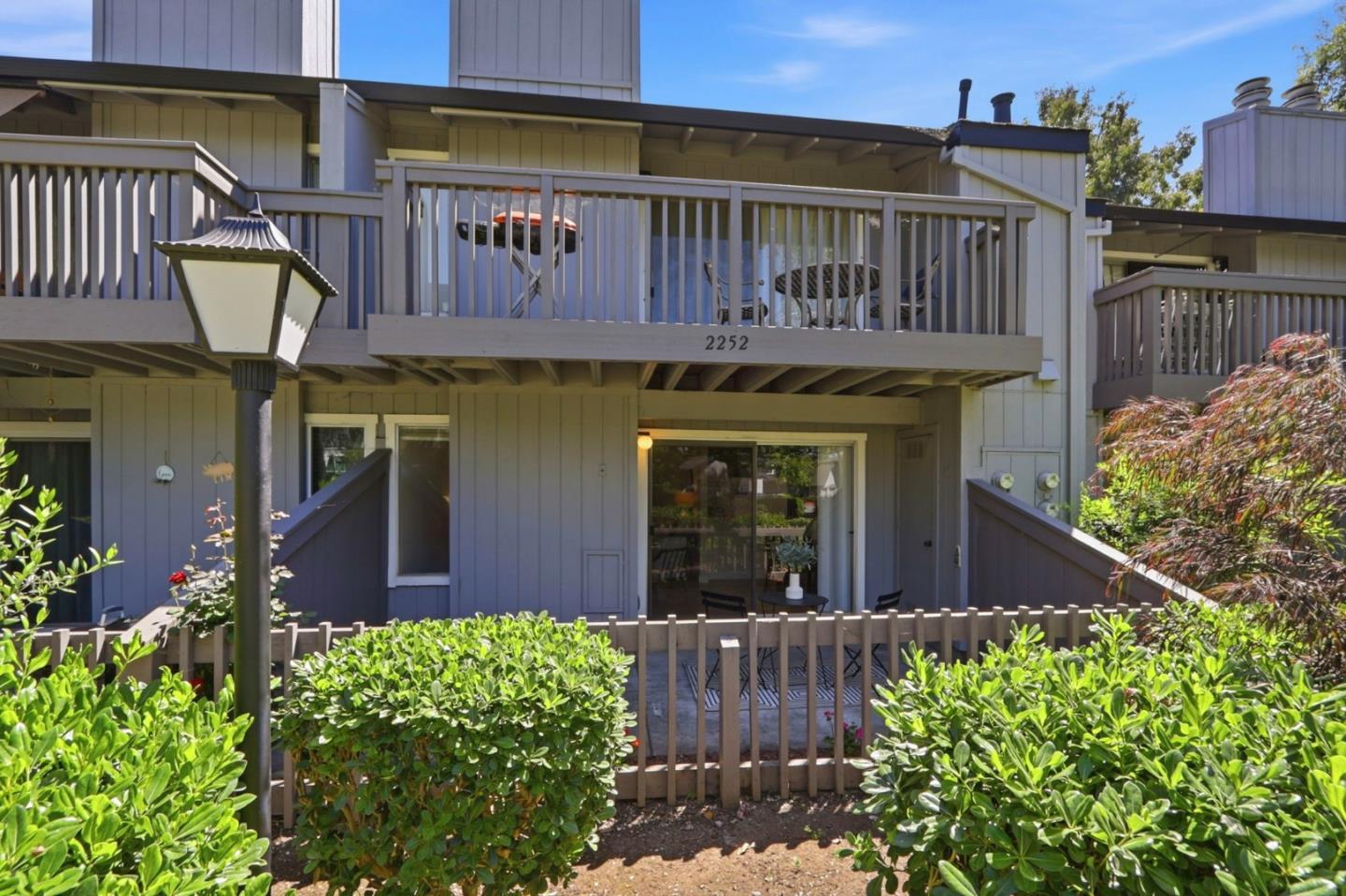 2252 Almaden Road, Unit A San Jose, CA 95125 - Photo 26 of 40 a view of a house with brick walls and flower plants