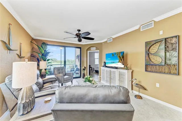 an aerial view of a house with a yard lake view and mountain view