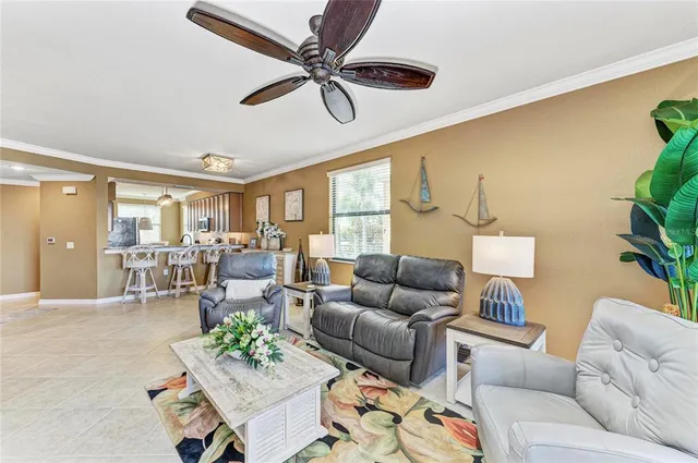 an aerial view of residential houses with outdoor space and swimming pool
