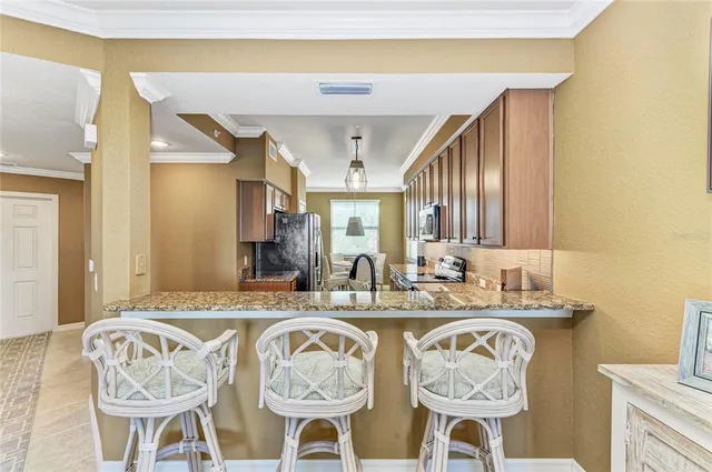 an aerial view of a swimming pool and mountain view