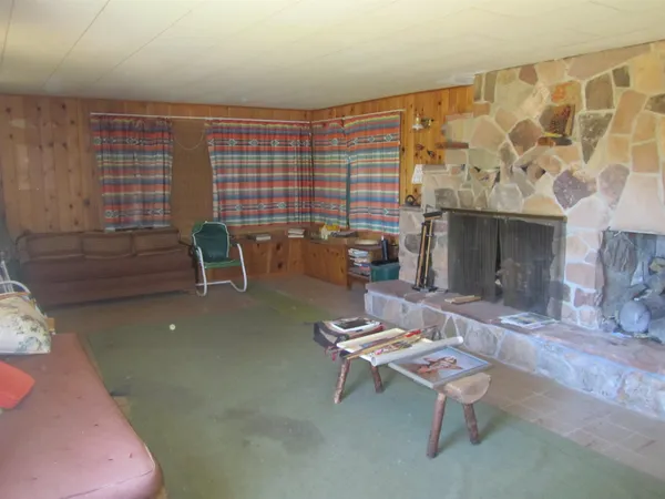 a living room with patio furniture