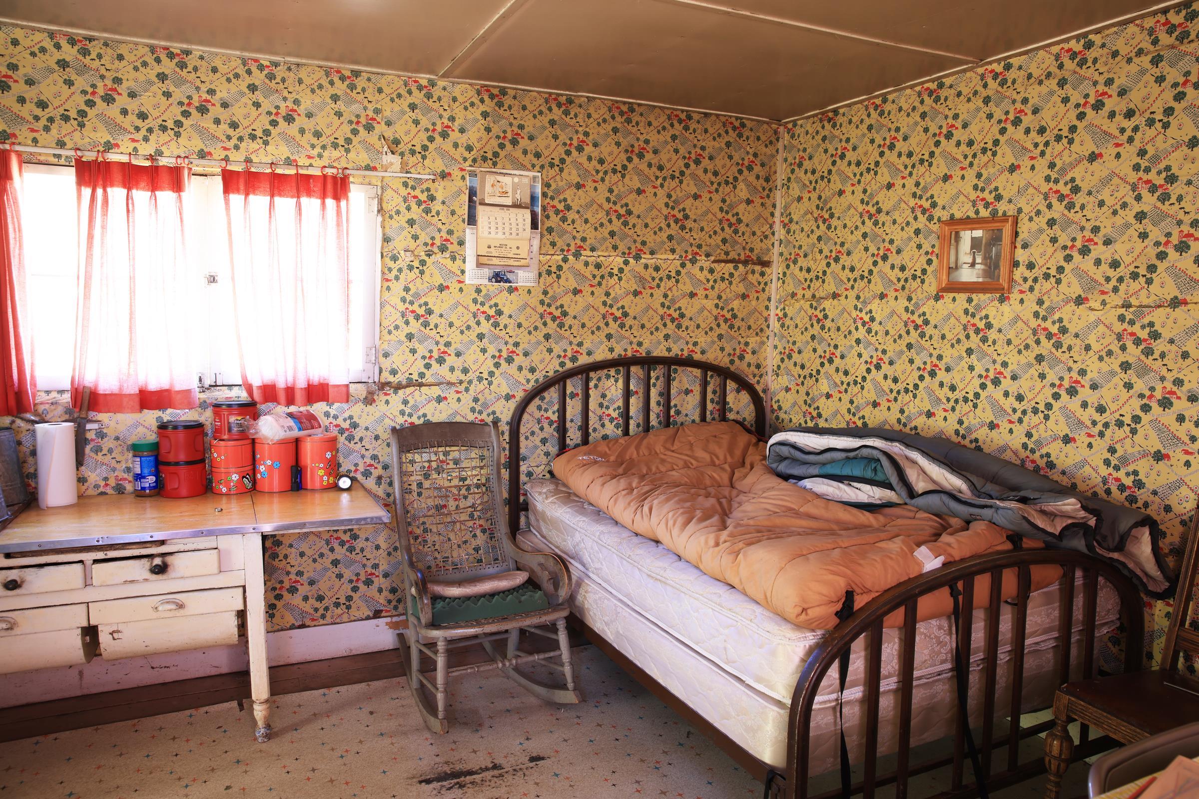 Tbd Divide Road, Unit ENTIRE PACKAGE Whitewater, CO 81527 - Photo 8 of 41 a bedroom with a bed and a window