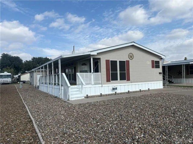 a front view of a house with a porch