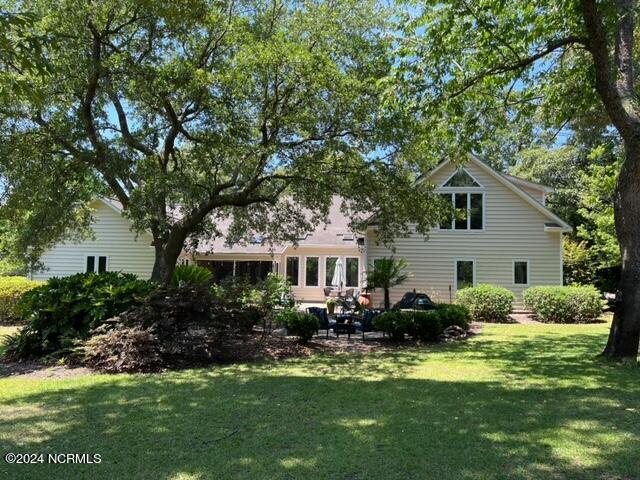 309 Center Drive Hampstead, NC 28443 - Photo 24 of 37 Backyard view of home