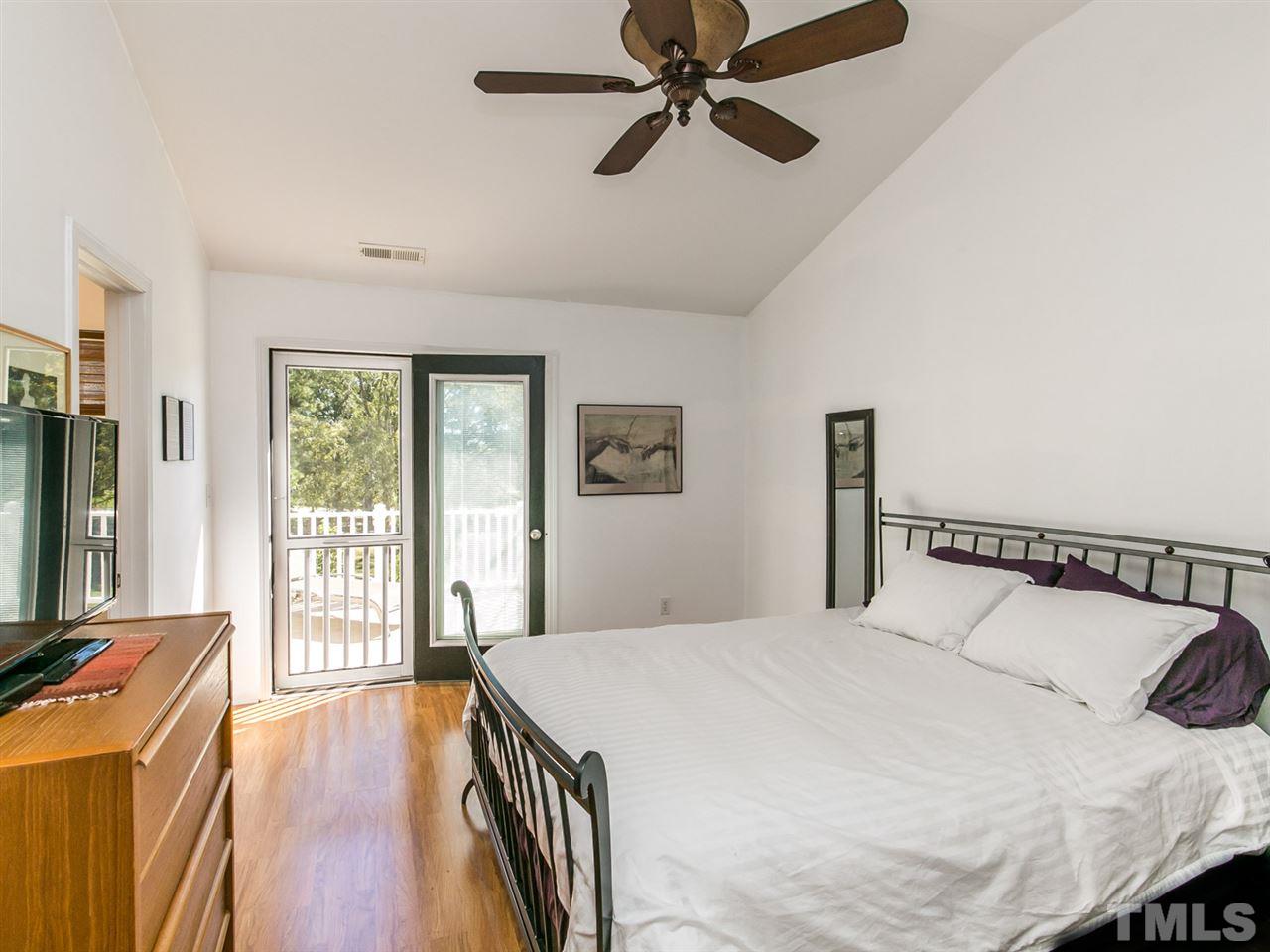2128 Persimmon Ridge Drive Raleigh, NC 27604 - Photo 10 of 25 The private balcony is accessed through french doors. You'll feel like you're on vacation!