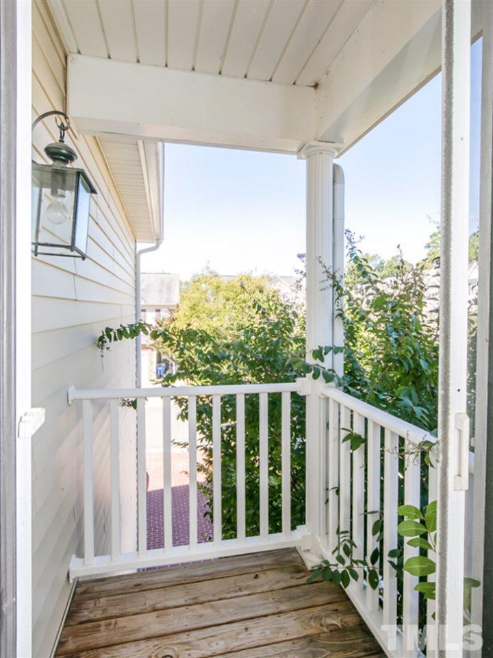 2128 Persimmon Ridge Drive Raleigh, NC 27604 - Photo 13 of 25 This cute little balcony is just off the 3rd bedroom.