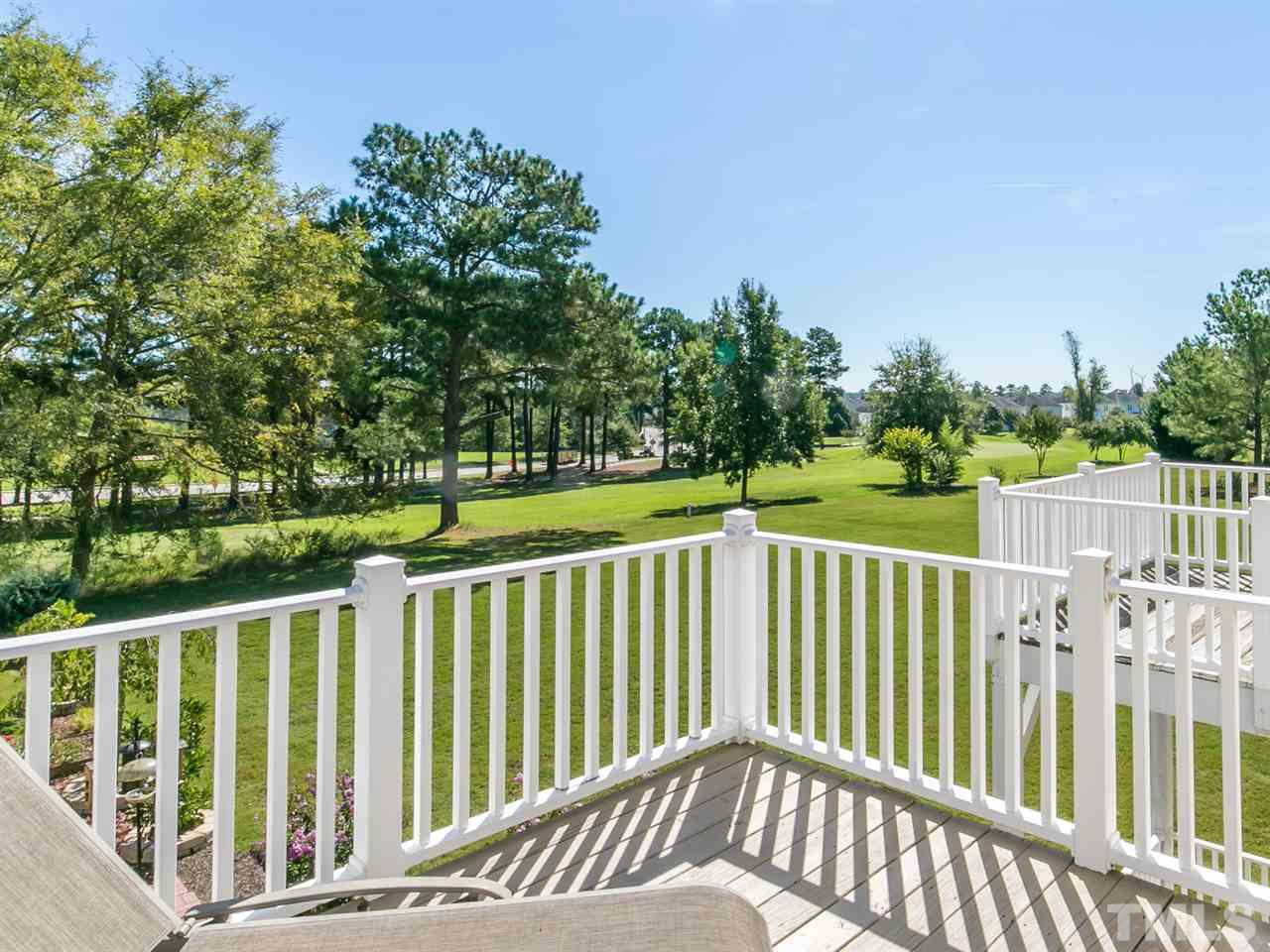 2128 Persimmon Ridge Drive Raleigh, NC 27604 - Photo 14 of 25 You'll love this balcony - take in the views, catch the sun and just relax a little.