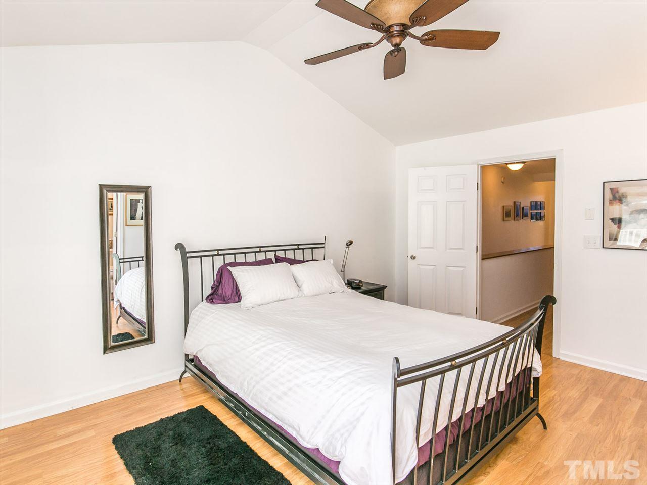 2128 Persimmon Ridge Drive Raleigh, NC 27604 - Photo 9 of 25 With a vaulted ceiling and the new floors this master feels exceptionally large.