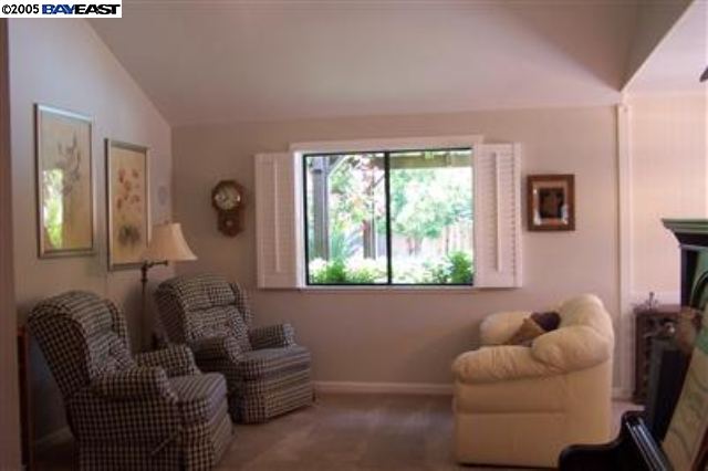 741 North Manley Road Ripon, CA 95366 - Photo 2 of 9 a living room with furniture and a window