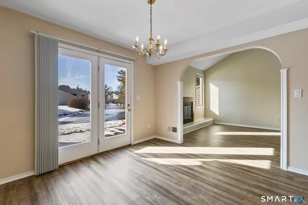 a view of an empty room and window