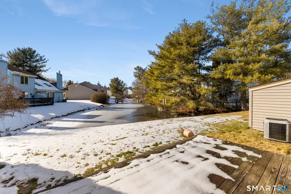 a view of the backyard of the house