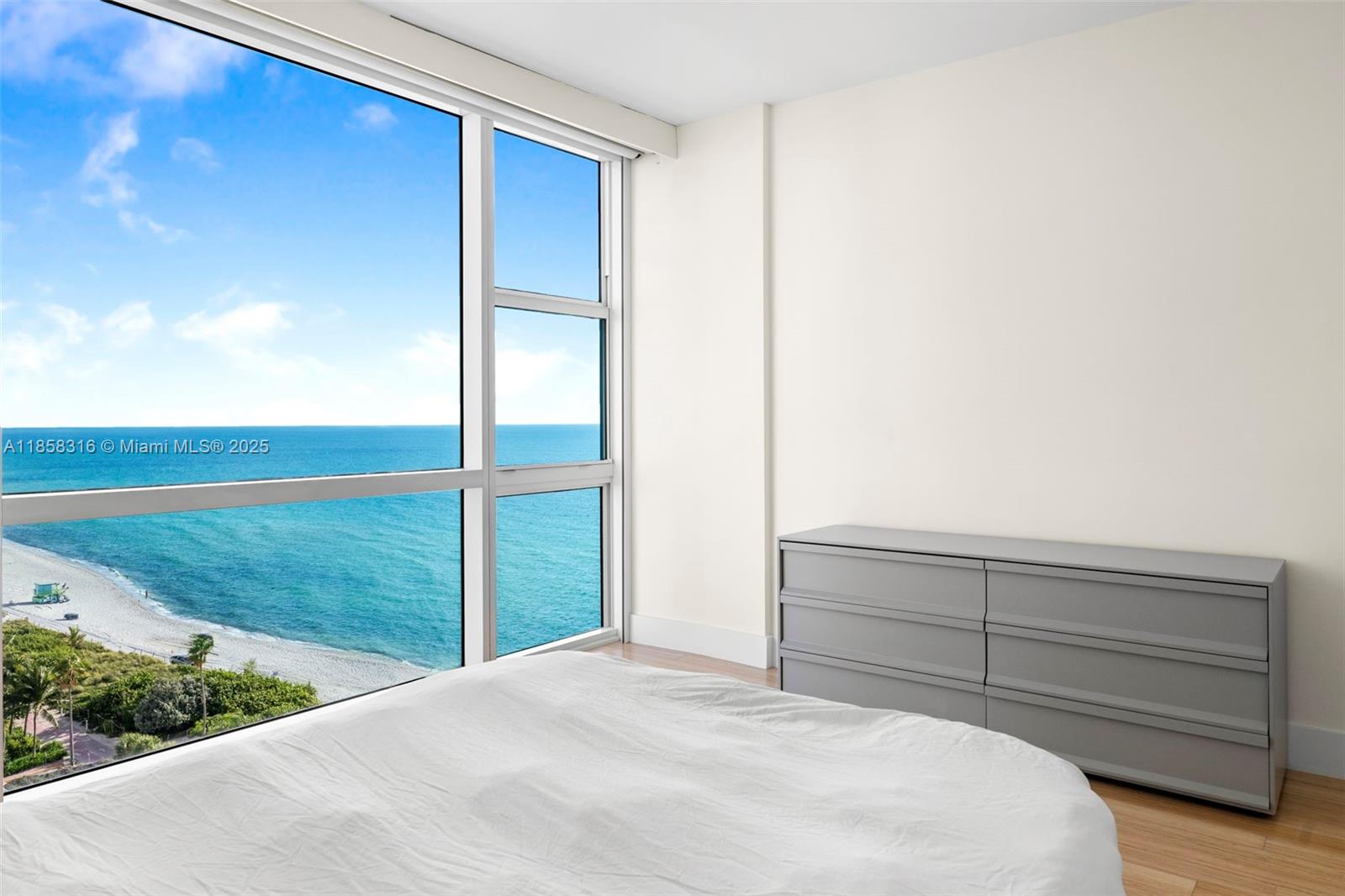 6801 Collins Avenue, Unit DOOR1409 Miami Beach, FL 33141 - Photo 11 of 21 a view of backyard with hardwood