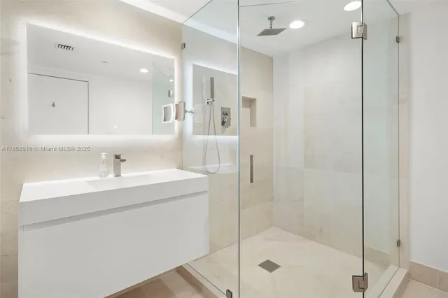 a bathroom with a bathtub and a sink