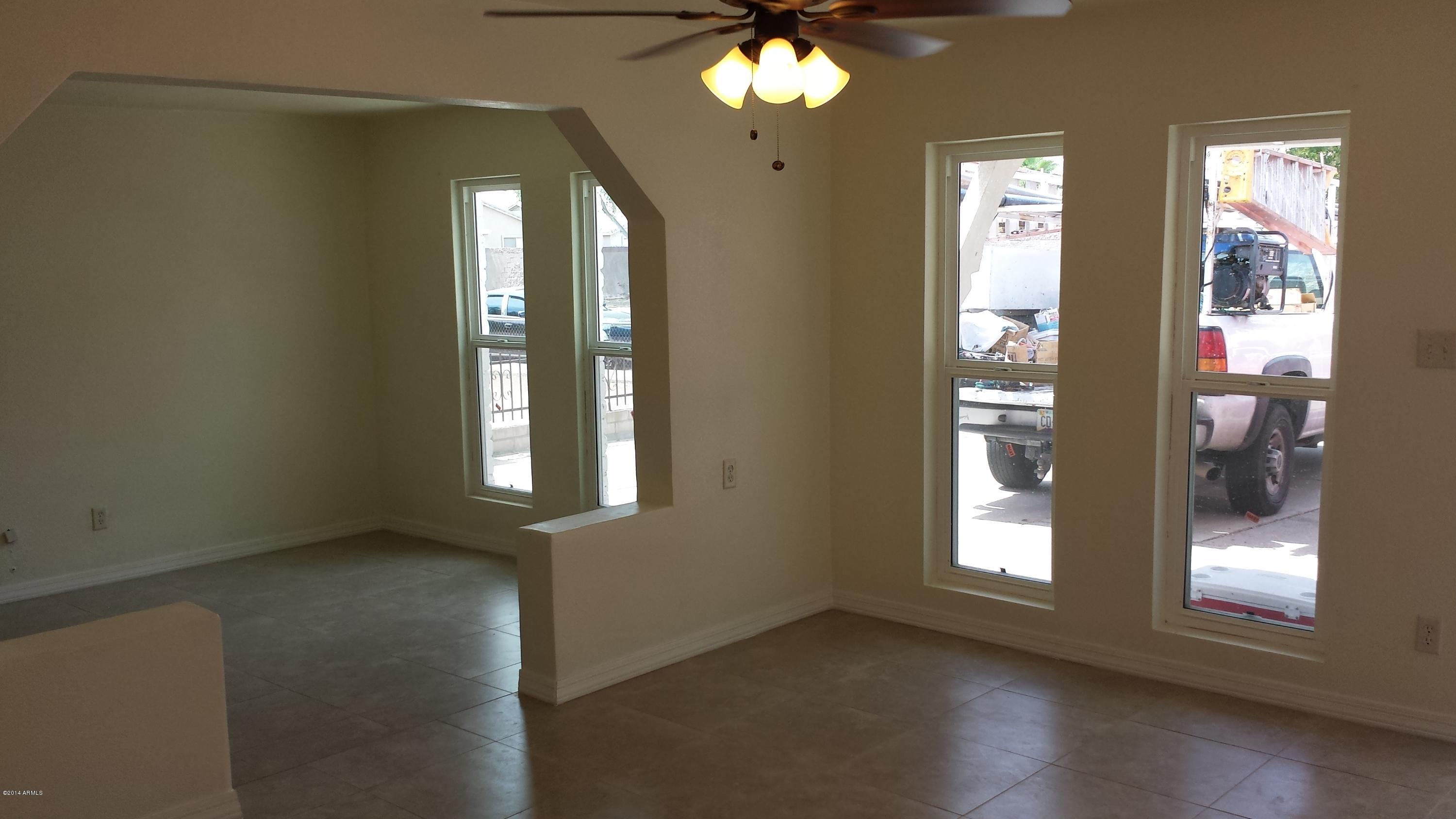 1627 West Vineyard Road Phoenix, AZ 85041 - Photo 3 of 37 20140626_141656