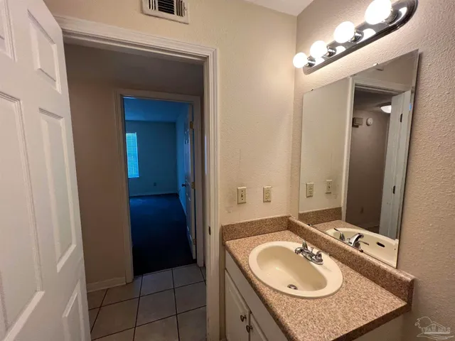 an empty room with a empty space and window