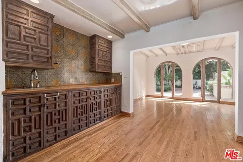 a view of front door with wooden floor