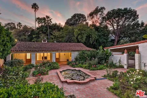 a view of a garden with a patio