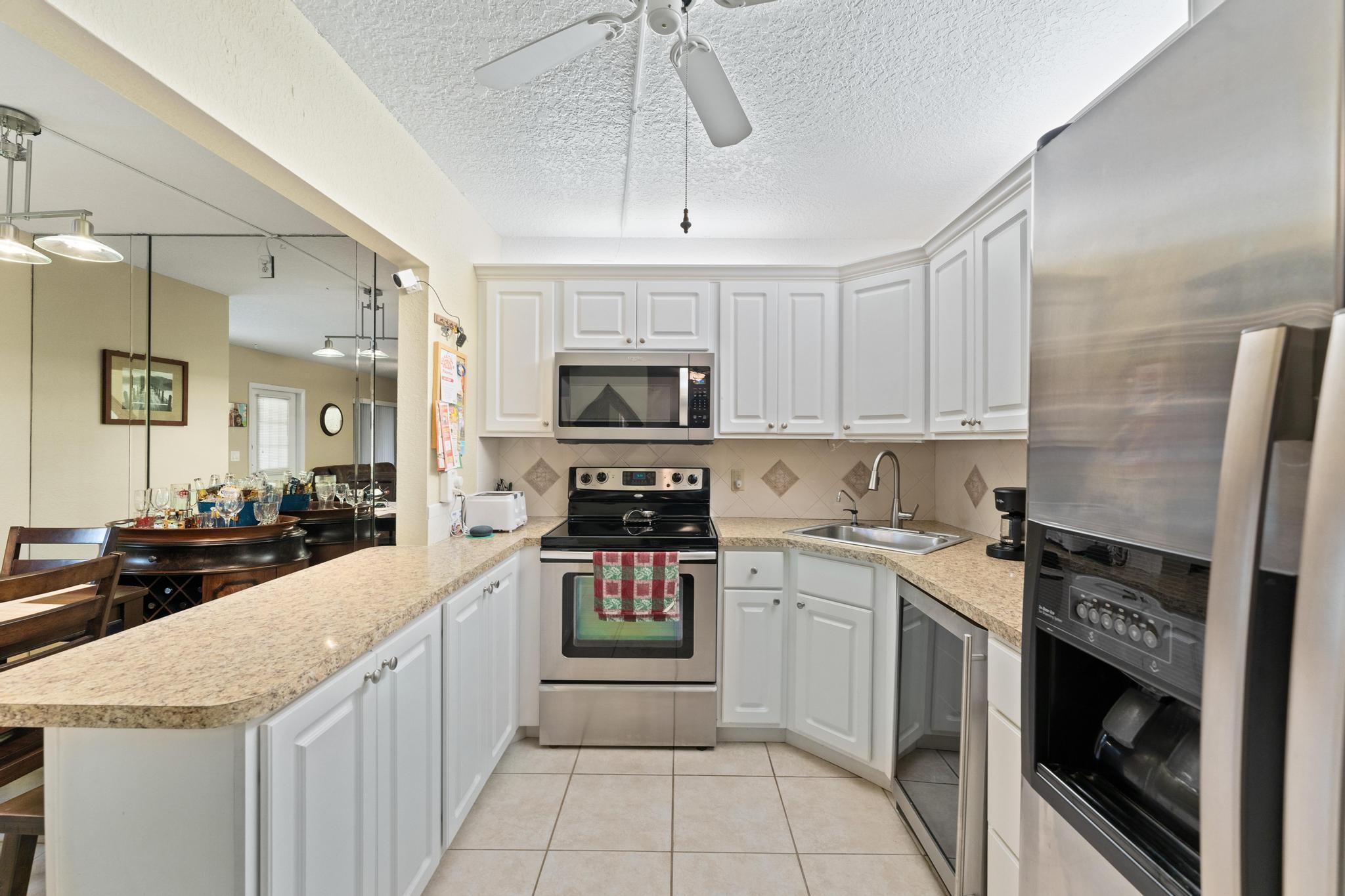 341 Pine Ridge Circle, Unit D1 Greenacres, FL 33463 - Photo 16 of 28 Kitchen