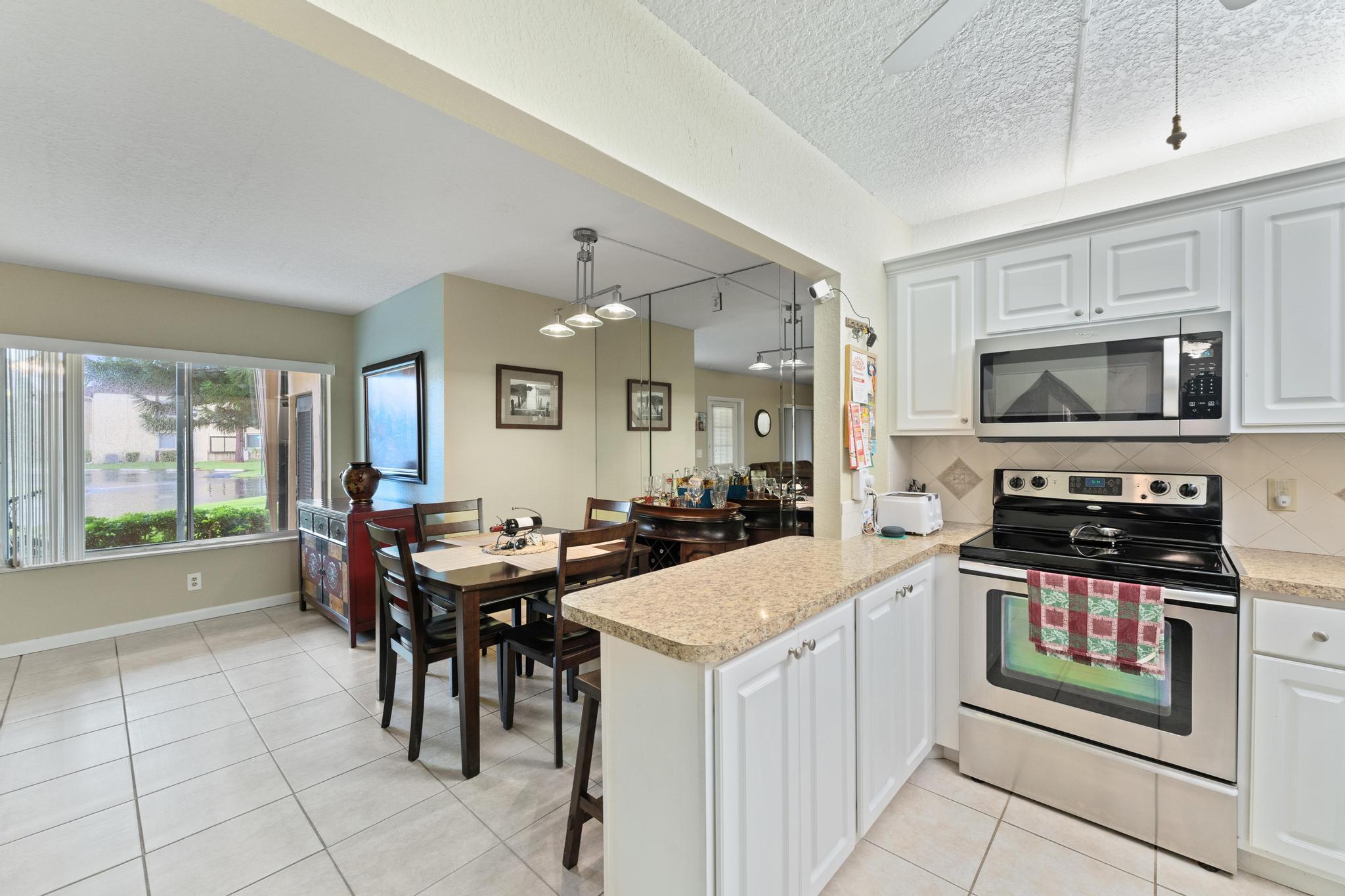 341 Pine Ridge Circle, Unit D1 Greenacres, FL 33463 - Photo 18 of 28 Kitchen