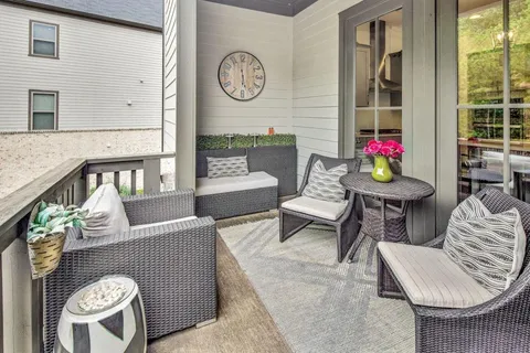 a living room with furniture and a table