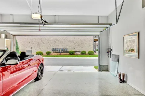 a bed room with a bed and a window