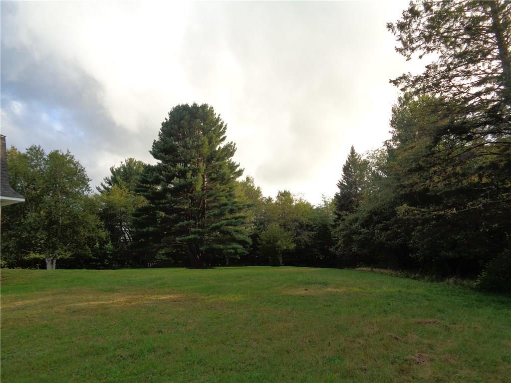 47 Main Road Abbot, ME 04406 - Photo 19 of 22 View of yard at two car garage entrance.
