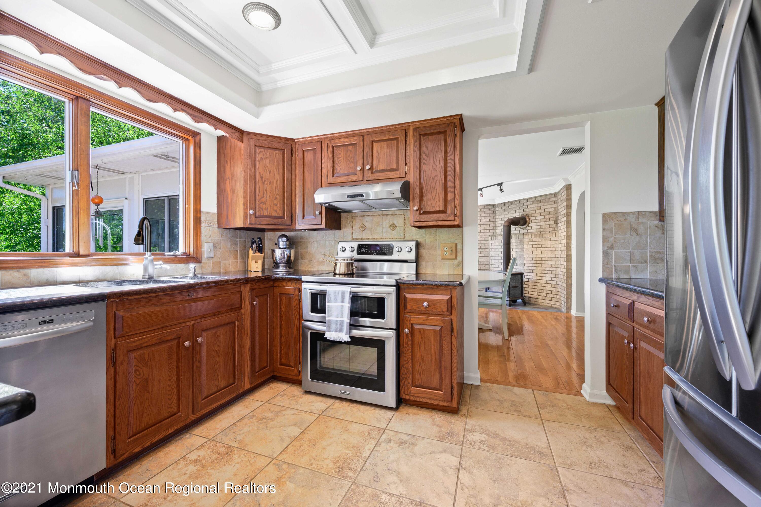 142 Manners Road Flemington, NJ 08822 - Photo 11 of 38 a kitchen with stainless steel appliances granite countertop a refrigerator oven a sink and dishwasher