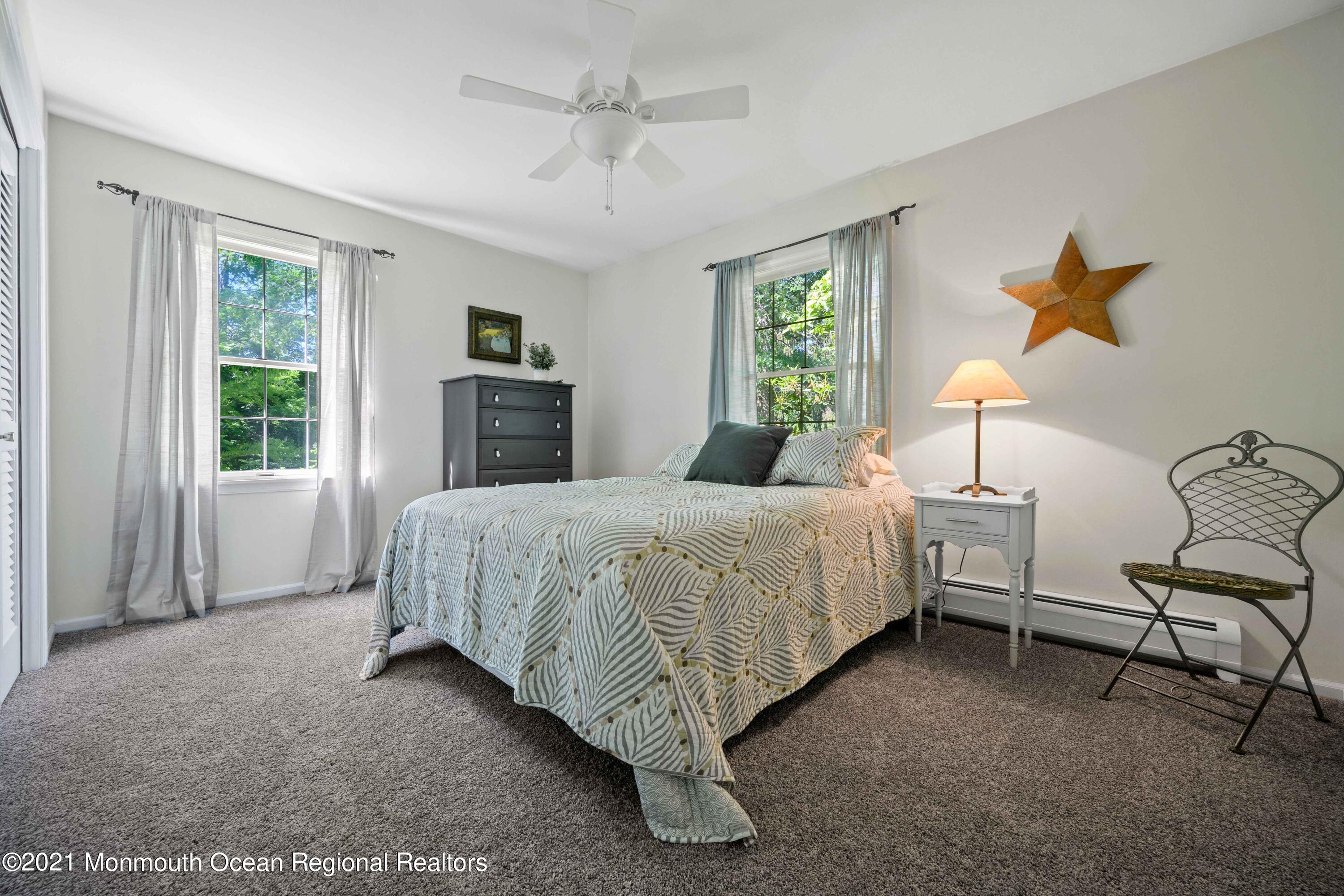 142 Manners Road Flemington, NJ 08822 - Photo 19 of 38 a bed sitting in a spacious bedroom next to a window