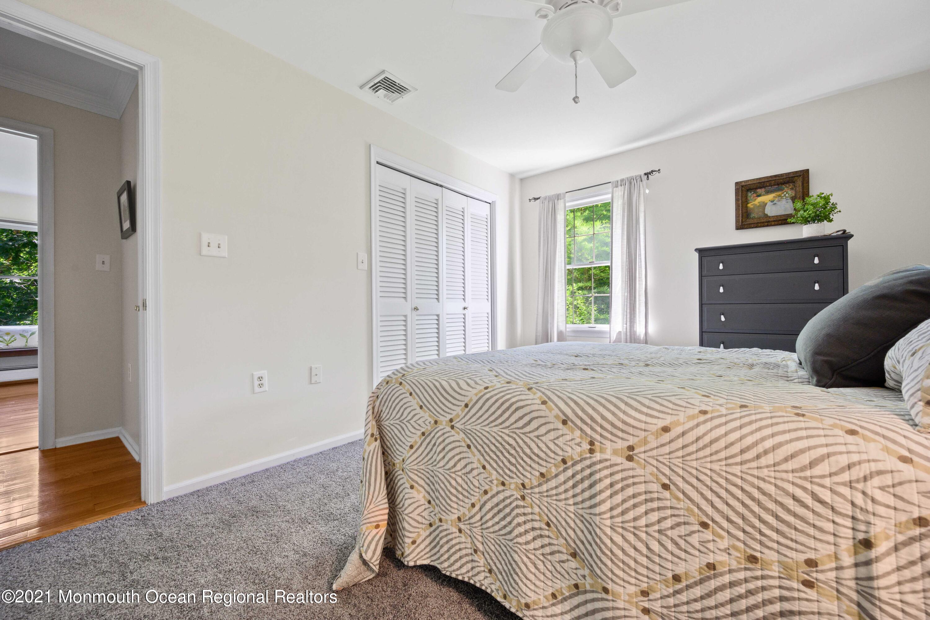 142 Manners Road Flemington, NJ 08822 - Photo 20 of 38 a bedroom with a bed and a dresser