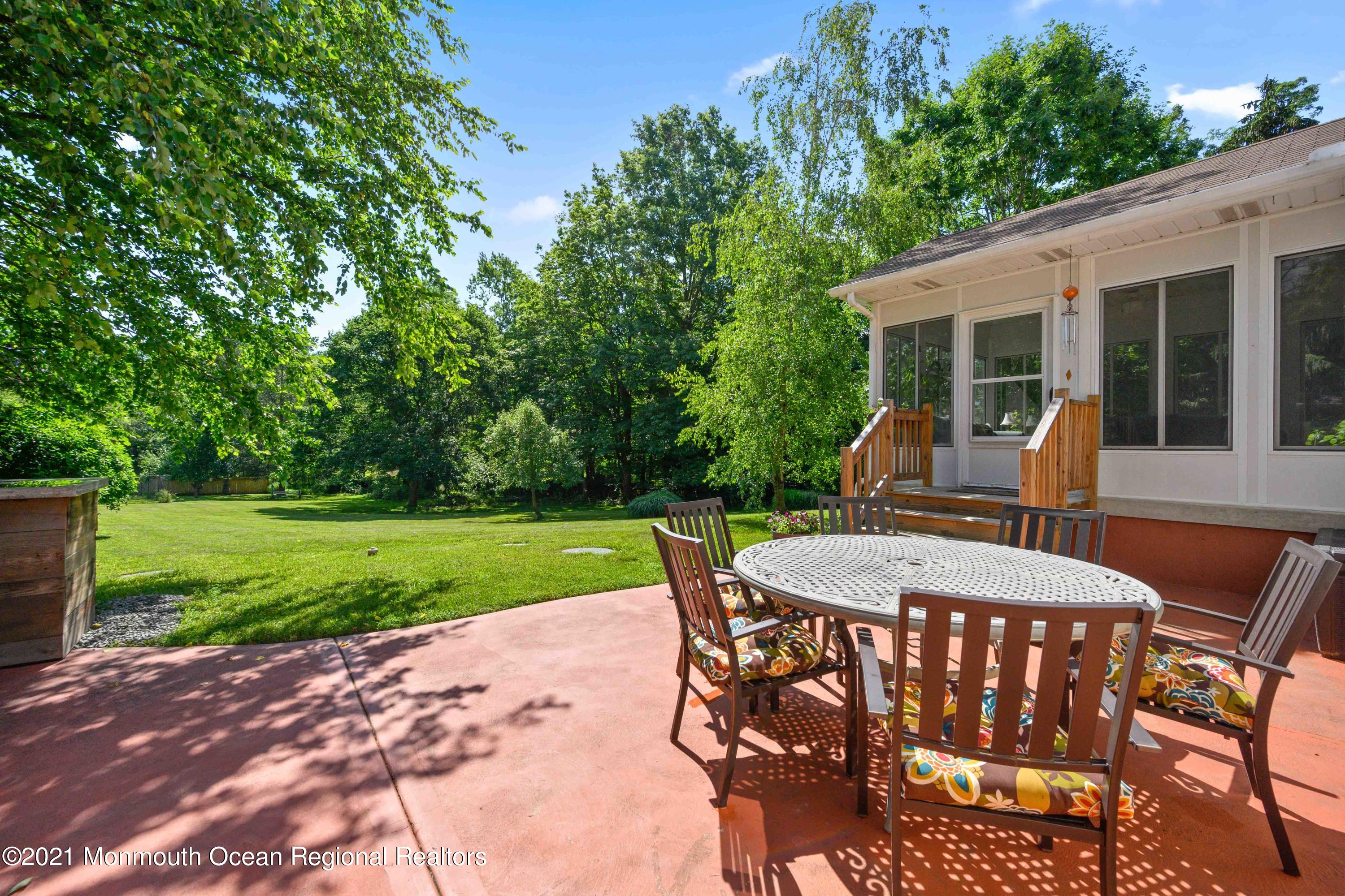 142 Manners Road Flemington, NJ 08822 - Photo 29 of 38 a patio with table and chairs