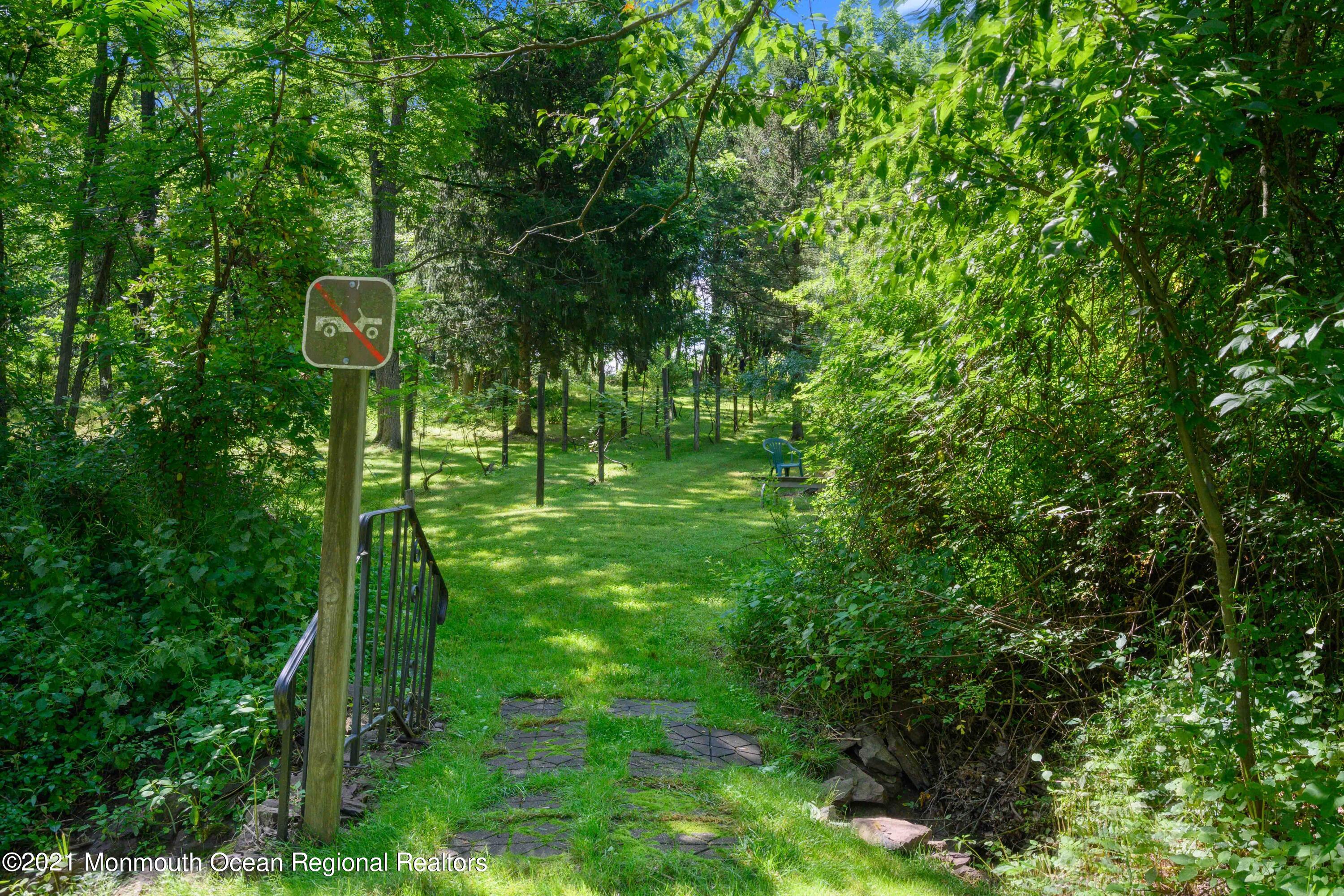 142 Manners Road Flemington, NJ 08822 - Photo 34 of 38 a green field with lots of trees in it