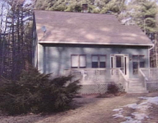 142 Minott Road Gardner, MA 01440 - Photo 1 of 1 a front view of a house with plants