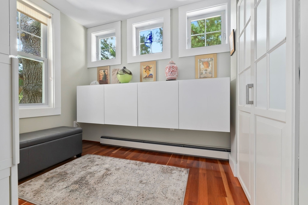 11 Beacon Street Amesbury, MA 01913 - Photo 14 of 42 a living room with furniture and a rug
