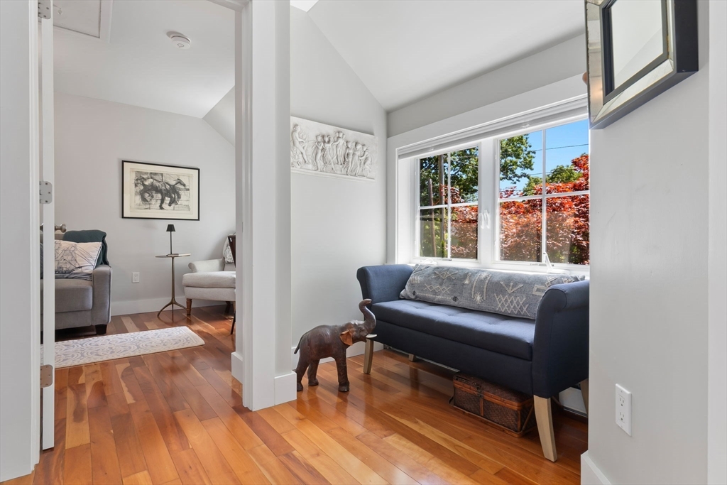 11 Beacon Street Amesbury, MA 01913 - Photo 18 of 42 a living room with furniture and a window