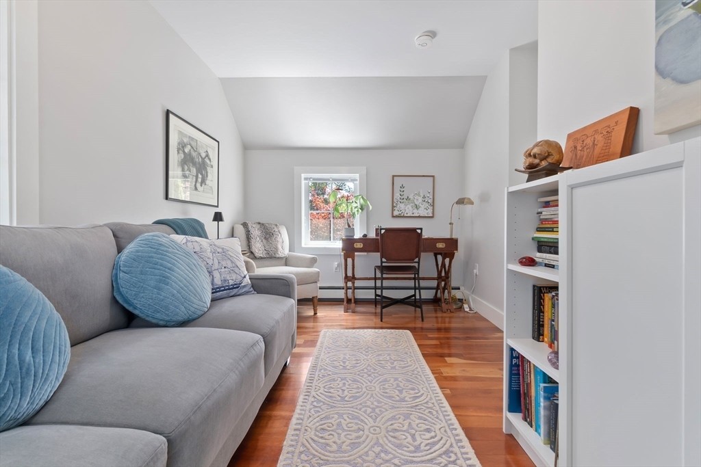 11 Beacon Street Amesbury, MA 01913 - Photo 19 of 42 a living room with furniture and a couch