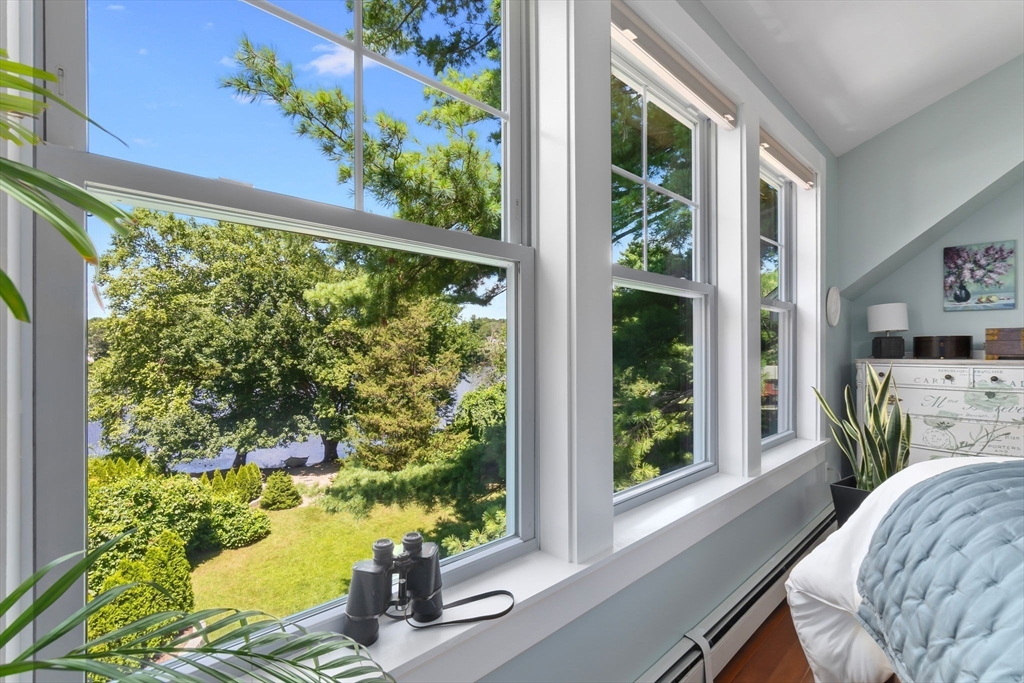 11 Beacon Street Amesbury, MA 01913 - Photo 21 of 42 a room with bed and a window