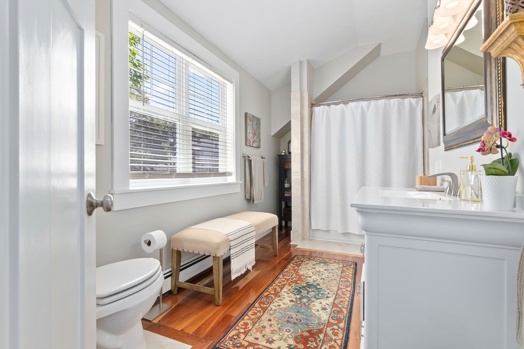 11 Beacon Street Amesbury, MA 01913 - Photo 25 of 42 a spacious bedroom with a bed and a window
