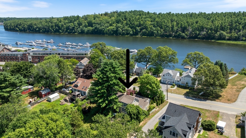 11 Beacon Street Amesbury, MA 01913 - Photo 36 of 42 an aerial view of a houses with a yard and lake view