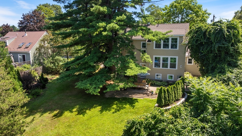 11 Beacon Street Amesbury, MA 01913 - Photo 38 of 42 a aerial view of a house with swimming pool and garden
