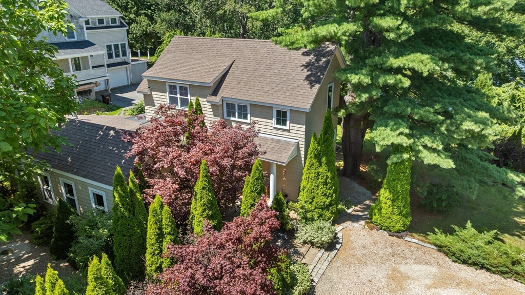11 Beacon Street Amesbury, MA 01913 - Photo 39 of 42 front view of a house with a yard