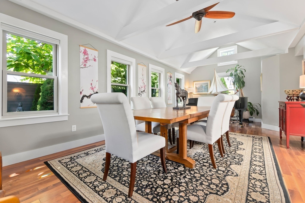 11 Beacon Street Amesbury, MA 01913 - Photo 8 of 42 a dining room with furniture a rug and wooden floor