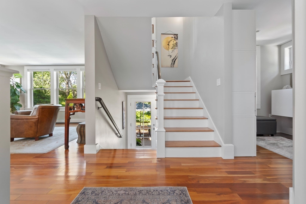 11 Beacon Street Amesbury, MA 01913 - Photo 9 of 42 a view of entryway and hall with wooden floor