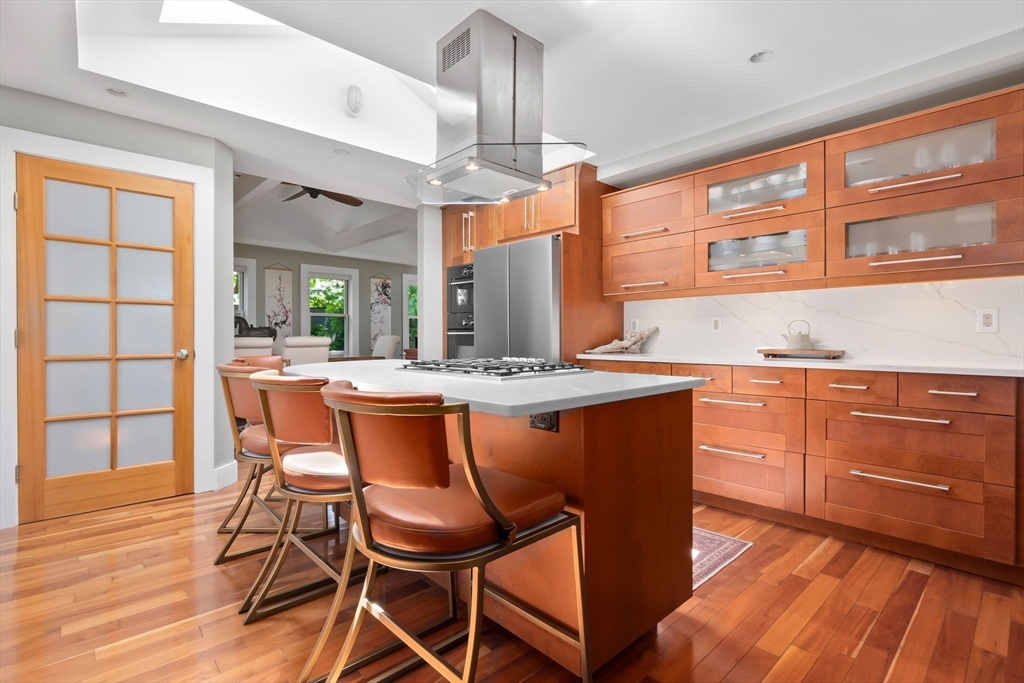 11 Beacon Street Amesbury, MA 01913 - Photo 10 of 42 a dining hall with stainless steel appliances granite countertop a stove and a sink