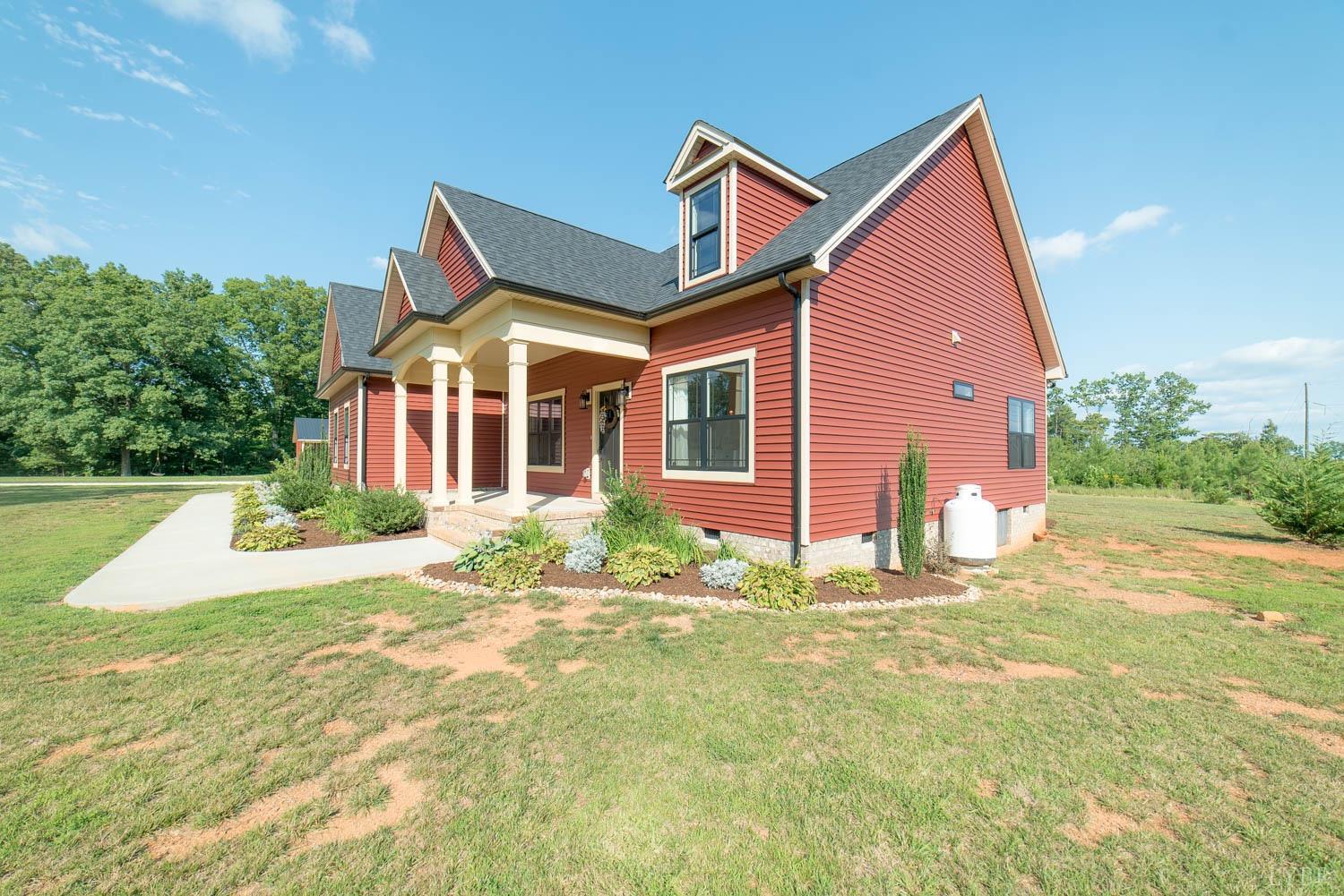 5972 Promise Land Road Appomattox, VA 24522 - Photo 2 of 84 a front view of a house with a yard