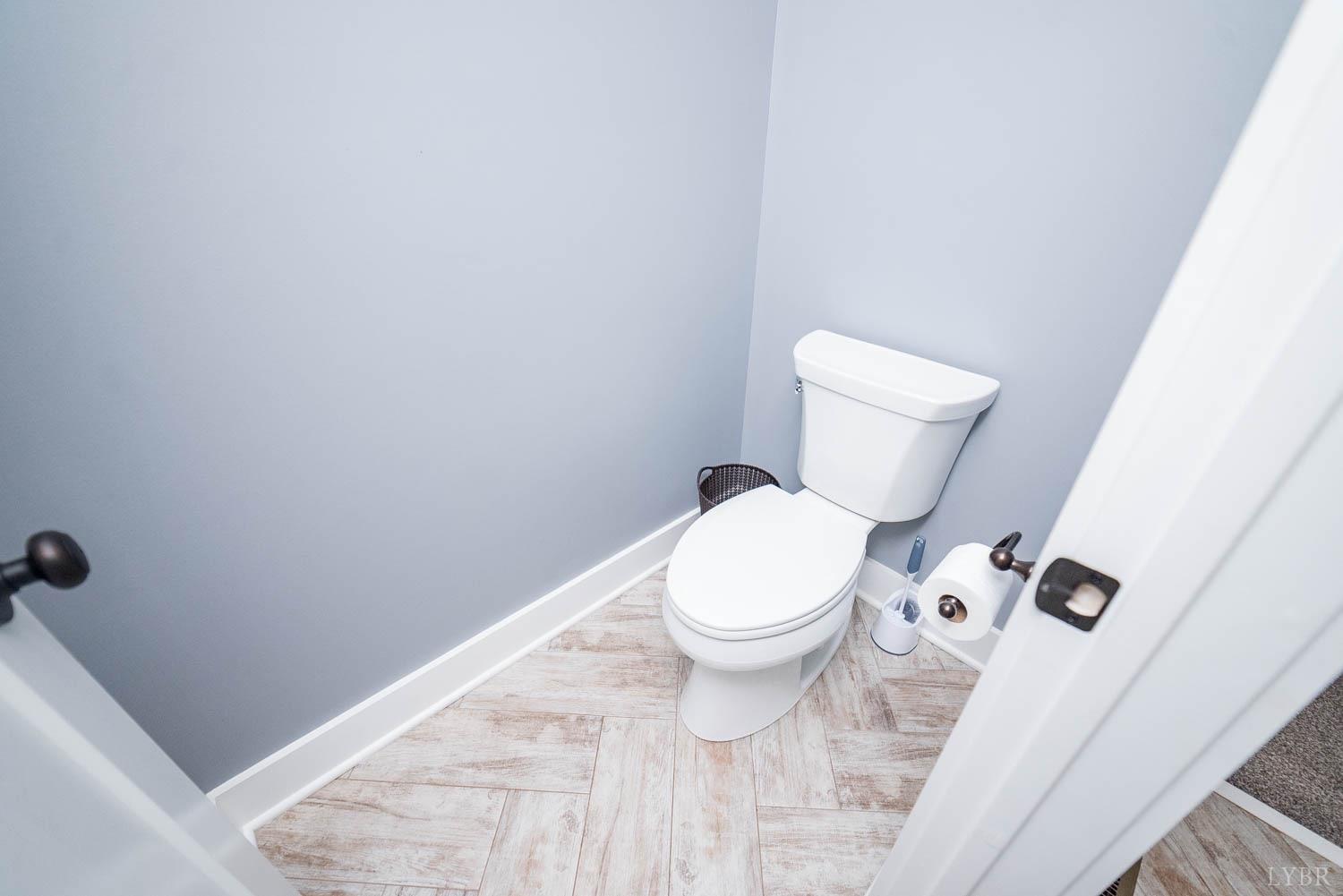 5972 Promise Land Road Appomattox, VA 24522 - Photo 38 of 84 a white toilet sitting next to a shower