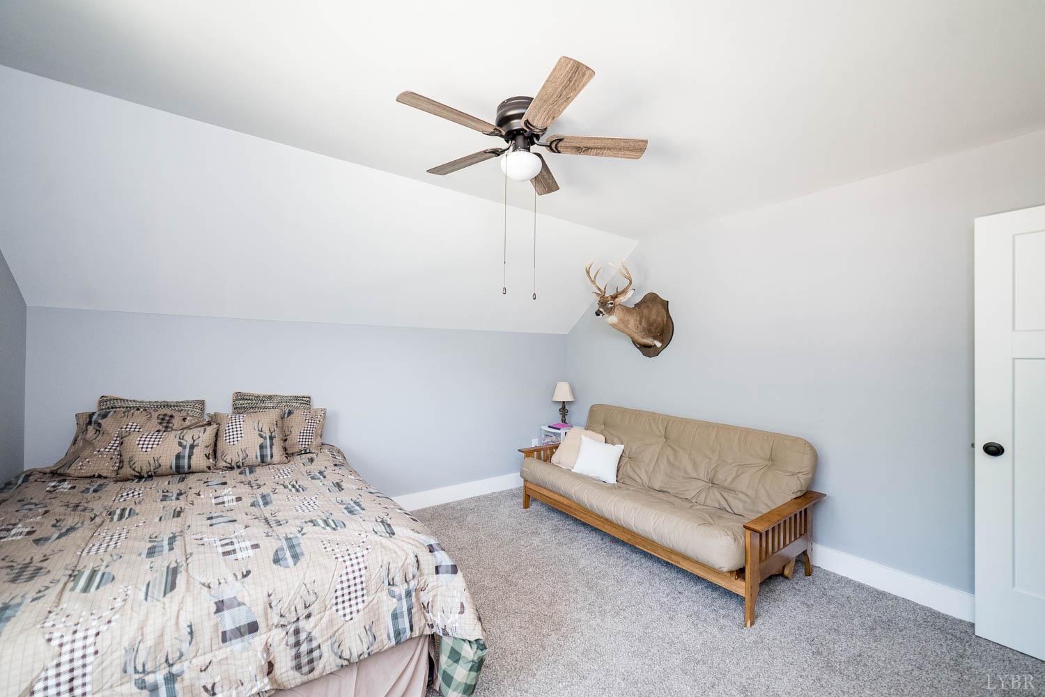 5972 Promise Land Road Appomattox, VA 24522 - Photo 43 of 84 a bedroom with a bed and window