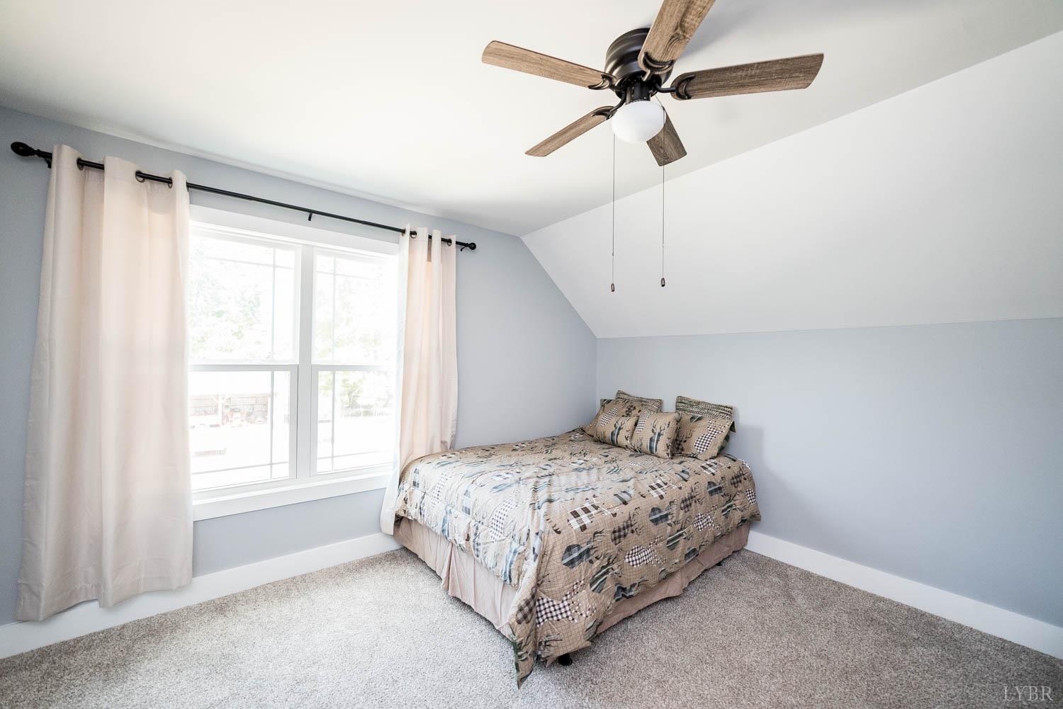 5972 Promise Land Road Appomattox, VA 24522 - Photo 44 of 84 a bedroom with a bed and a window