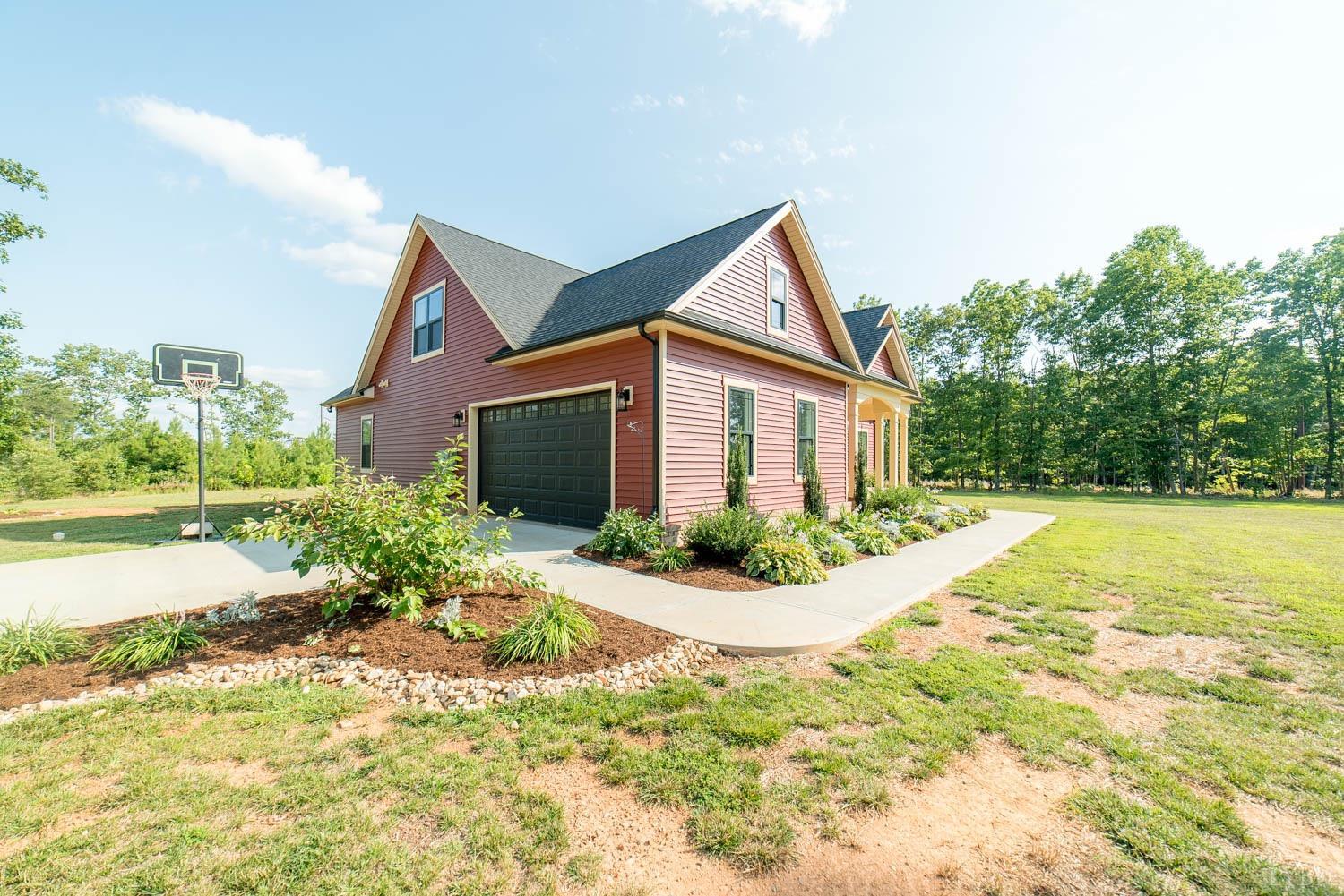 5972 Promise Land Road Appomattox, VA 24522 - Photo 58 of 84 a view of a house with yard and plants