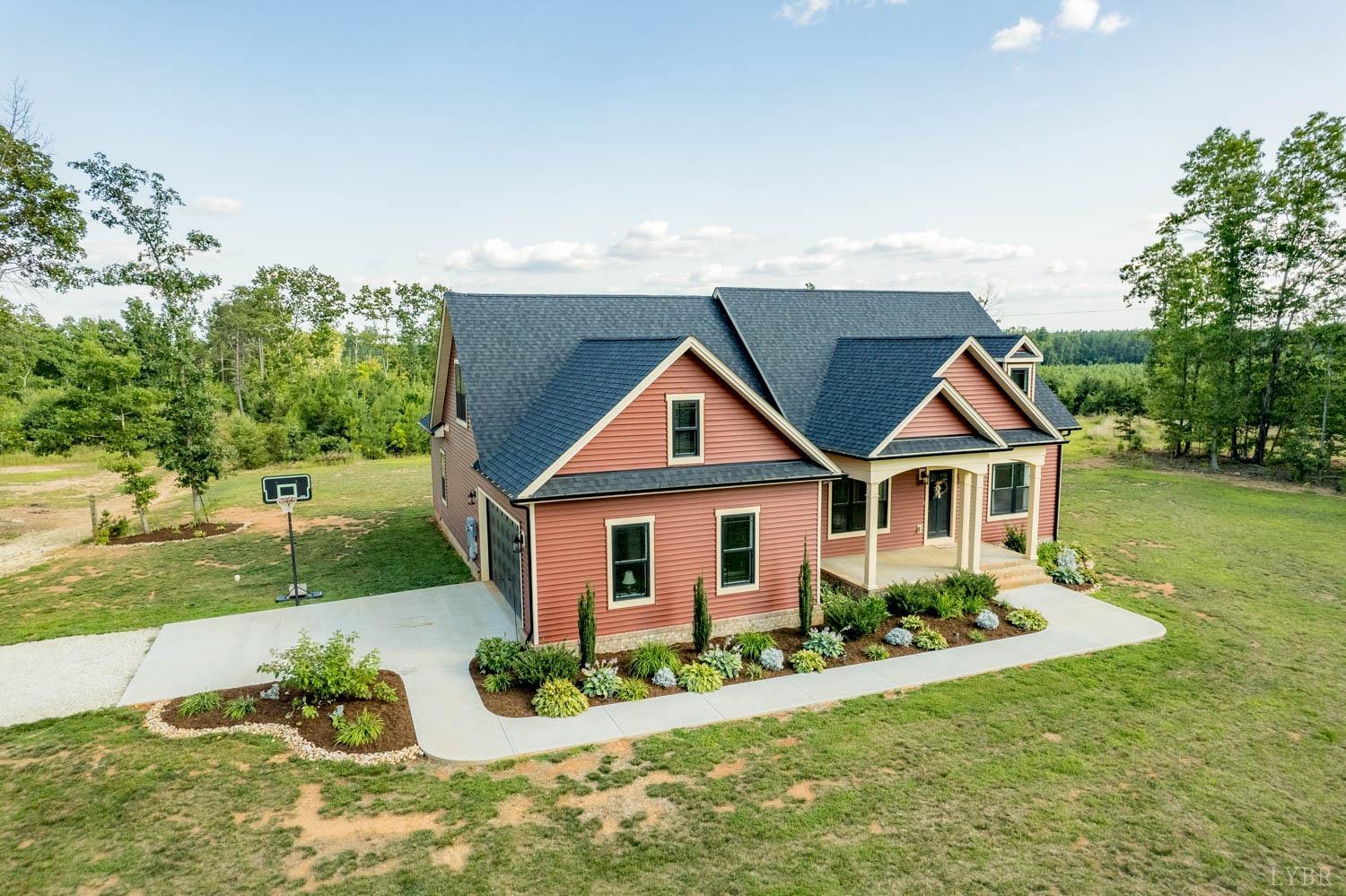 5972 Promise Land Road Appomattox, VA 24522 - Photo 65 of 84 a front view of a house with garden